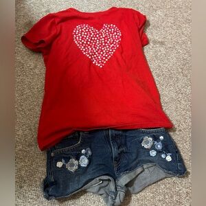 Red and blue set of shorts and a shirt.